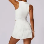 Sweltering - Set Sportivo Donna 2 Pezzi con Top e Gonna-Shorts Push Up - immagine 3