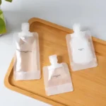 FlexiPouch – Set 5 Sacchetti Riutilizzabili da Viaggio per Cosmetici Liquidi, Shampoo, Lozione (30ml/50ml/100ml) - immagine 2