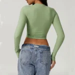 Top sportivo donna a maniche lunghe push up per palestra e yoga - immagine 2