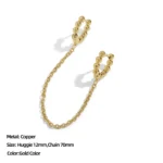 Orecchino a polsino oro con catene e perline metalliche - immagine 3