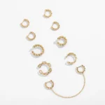 Orecchino a polsino oro con catene e perline metalliche - immagine 2