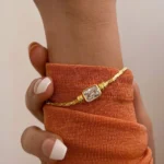 Bracciale donna in acciaio oro con cristallo quadrato