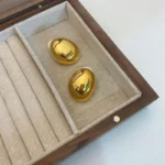 Orecchini pendenti rotondi geometrici donna stile punk - immagine 6