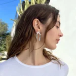 Orecchini pendenti fiocco a catena lunga placcati oro - immagine 5