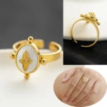 Anello donna acciaio dorato con pietra naturale rotonda - immagine 3