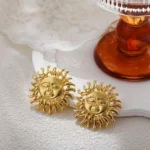 Orecchini vintage simbolo celeste in acciaio dorato 18K - immagine 2