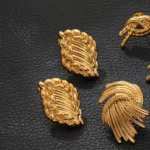 Orecchini a foglia intrecciata placcati oro donna - immagine 4