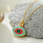 Collana malocchio smaltato con ciondolo occhi di cristallo - immagine 5