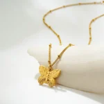 Collana donna oro con ciondolo serpente e farfalla - immagine 5