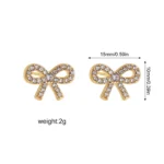 Orecchini mini fiocco in zircone CZ color oro - immagine 6