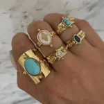 Anello donna acciaio dorato con pietra naturale rotonda