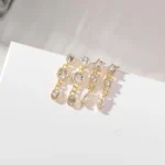 Set 2 paia orecchini a catena con zirconi placcati oro - immagine 5