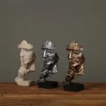 Statua decorativa viso silenzioso in resina 17 cm