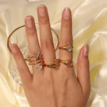 Anello regolabile dorato a tre strati con cristalli - immagine 2