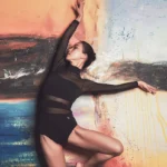 Body da danza e yoga donna in rete con maniche lunghe