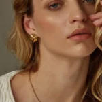 Orecchini donna nodo intrecciato triplo strato oro - immagine 4
