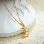 Collana donna luna e stella in acciaio oro - immagine 4