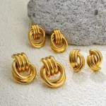 Set 3 paia orecchini nodo intrecciato in acciaio oro