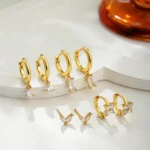 Set di piccoli orecchini a cerchio con zirconi placcati oro 14k - immagine 3