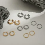 Set 3 orecchini a cerchio in acciaio oro impilabili - immagine 5