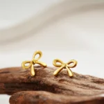 Set 3 paia orecchini a fiocco piccoli in metallo - immagine 4