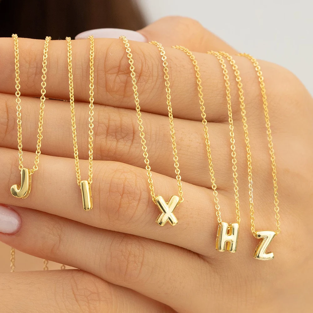 kf-S5e570e54eec94dfa9dc7a9027a763527r Collana lettera minuscola placcata oro per donna - immagine 1