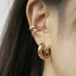 Set 3 orecchini a cerchio in acciaio oro impilabili - immagine 3