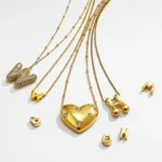 Collana iniziale a bolle oro con zirconi cubici - immagine 2