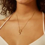 Collana boho donna con ciondoli luna, stella, sole e mano Hamsa - immagine 4
