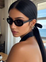 Occhiali da sole neri ovali classici unisex