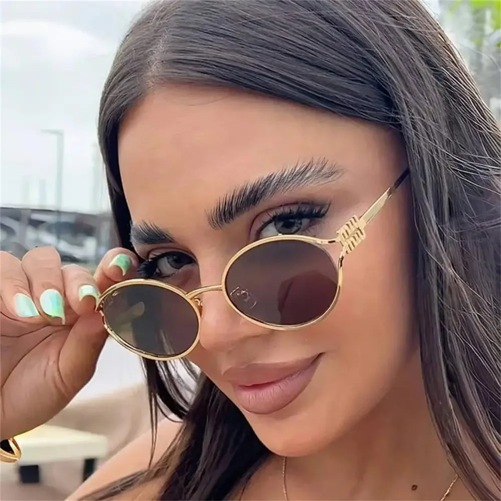 kf-S6c9936613aed411b9de9e455b3db7bb6I Occhiali da sole donna ovali in metallo eleganti - immagine 1