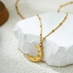 Collana donna luna e stella in acciaio oro - immagine 3