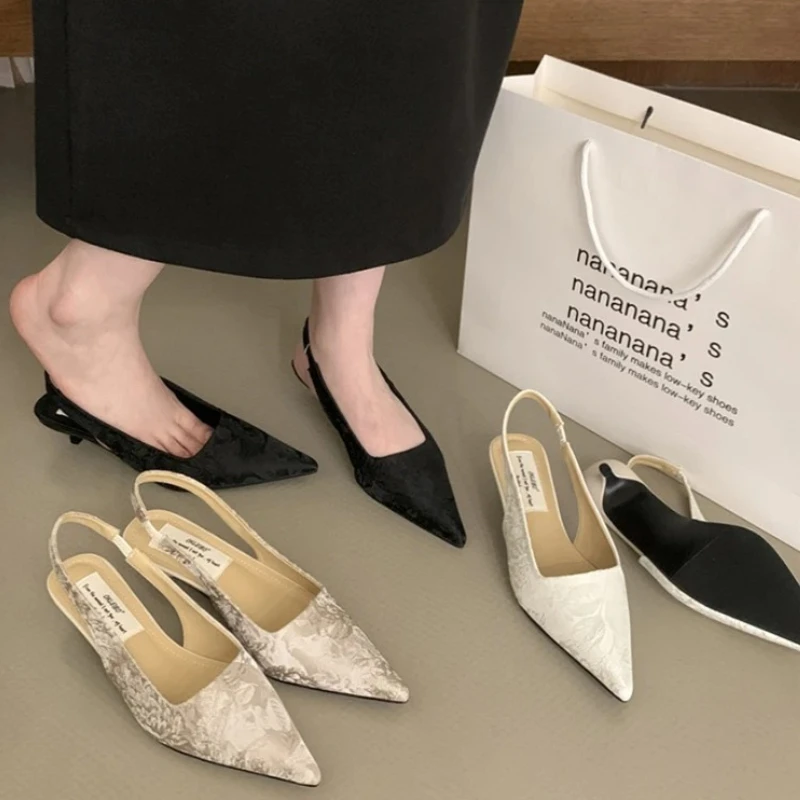 kf-S849d3a86abfe4d58baac5fe7deb5d724u Sandali mules estivi donna con tacco basso elegante - immagine 1