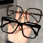 Set 2 occhiali rettangolari grandi con lenti trasparenti