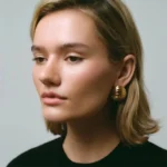 Orecchini nodo multistrato in acciaio 316L oro 18K - immagine 4