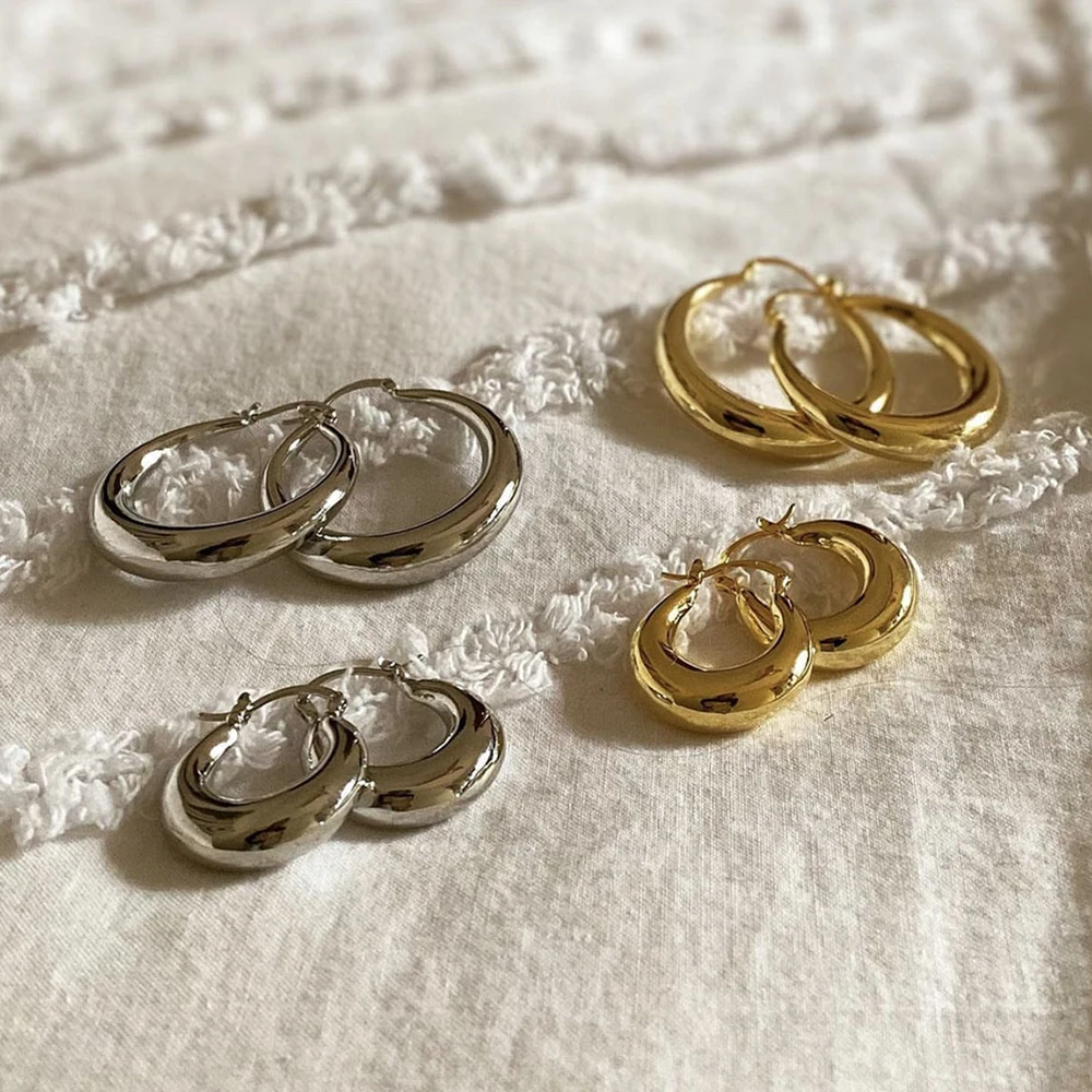 kf-S90e82acbbaf74a149c74c11ae9171c70Q Orecchini a cerchio dorati spessi in acciaio inox - immagine 1