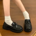 Mocassini donna stile college con nodo e tacco largo - immagine 3