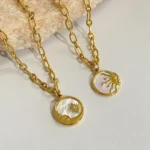Collana vintage sole e luna con pendente a conchiglia - immagine 3