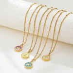 Collana donna placcata oro con ciondolo croce e stella luna - immagine 2