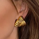 Orecchini rotondi geometrici vintage in acciaio dorato - immagine 4