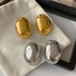 Orecchini pendenti rotondi geometrici donna stile punk - immagine 2