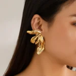 Orecchini a bottone vintage foglia di giglio in acciaio inox