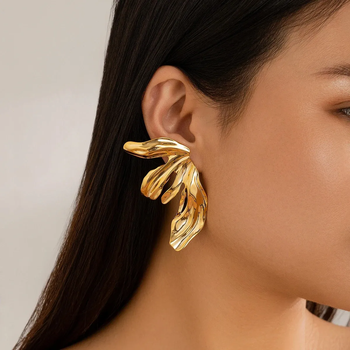 kf-Sc84905ed471647178a3042b84be9a8a0E Orecchini a bottone vintage foglia di giglio in acciaio inox - immagine 1