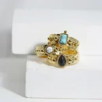 Anello donna acciaio dorato con pietra naturale rotonda - immagine 4