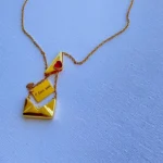 Collana busta "Ti amo" in acciaio con zircone rosso