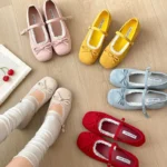 Scarpe Mary Jane con rialzo interno e fiocco a farfalla