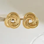 Orecchini a bottone nodo ruotato in acciaio placcato oro - immagine 5