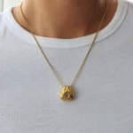 Collana pendente geometrica vintage con zirconi