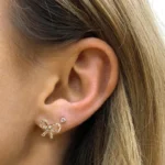 Orecchini mini fiocco in zircone CZ color oro - immagine 3