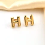 Orecchini iniziale donna in acciaio oro 18K - immagine 5